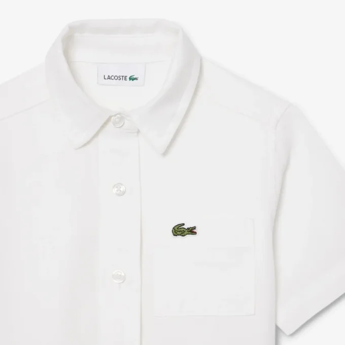 Abito camicia con gonna a pieghe in popeline Abito camicia con gonna a pieghe in popeline