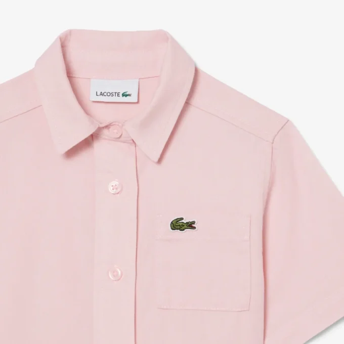 Abito camicia con gonna a pieghe in popeline Abito camicia con gonna a pieghe in popeline