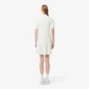 Abito da donna con colletto polo plissettato Abito da donna con colletto polo plissettato