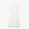Abito da donna con colletto polo plissettato Abito da donna con colletto polo plissettato