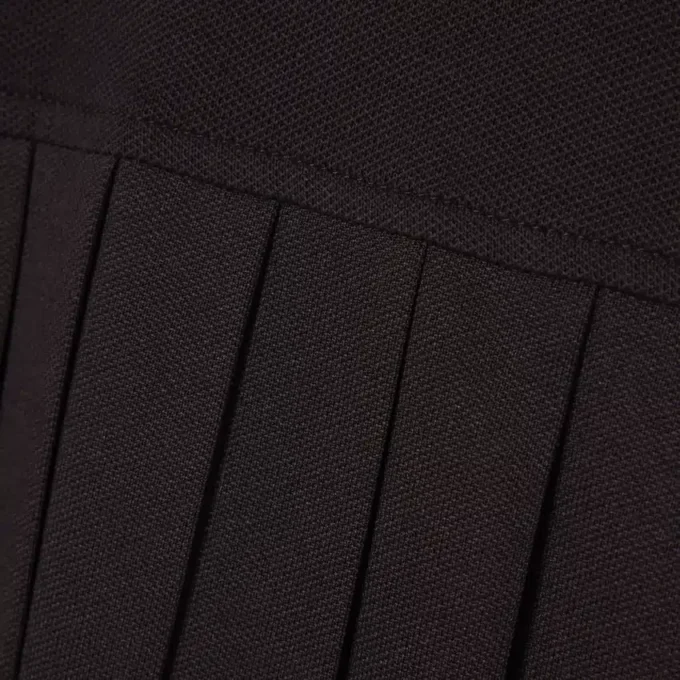 Abito polo plissettato in piqué elasticizzato Abito polo plissettato in piqué elasticizzato