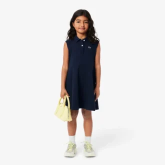 Abito polo senza maniche in piqué elasticizzato per bambini Abito polo senza maniche in piqué elasticizzato per bambini