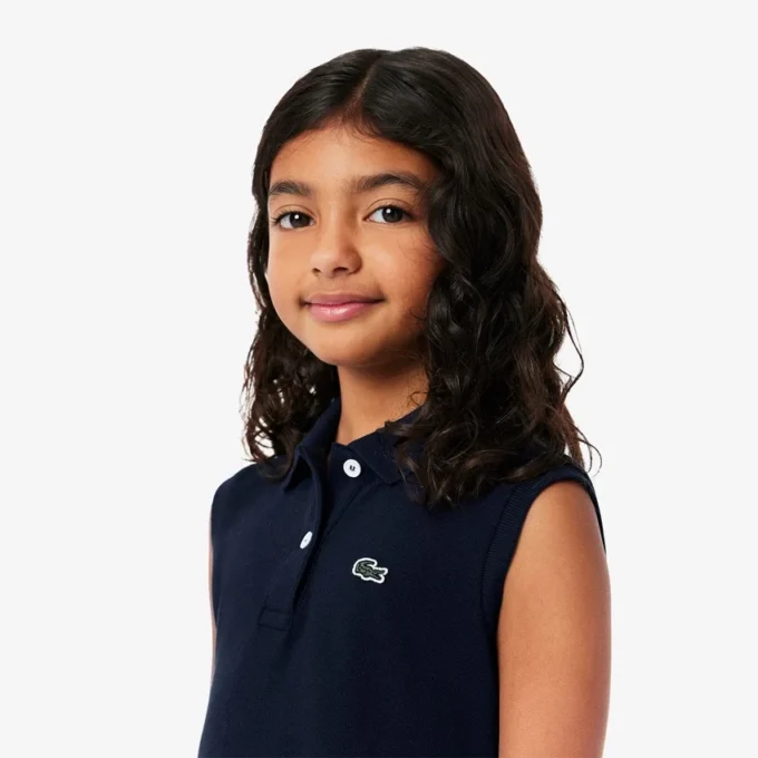 Abito polo senza maniche in piqué elasticizzato per bambini Abito polo senza maniche in piqué elasticizzato per bambini