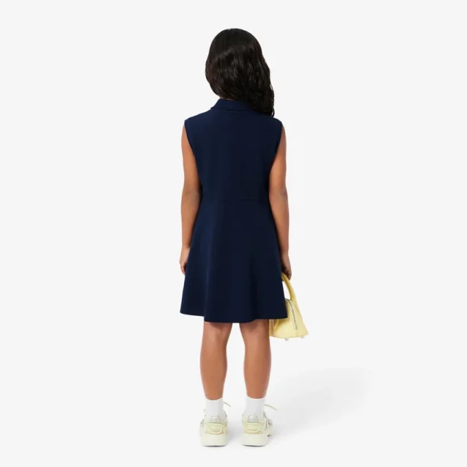 Abito polo senza maniche in piqué elasticizzato per bambini Abito polo senza maniche in piqué elasticizzato per bambini