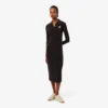 Abito polo slim fit con stemma ricamato Abito polo slim fit con stemma ricamato