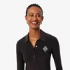Abito polo slim fit con stemma ricamato Abito polo slim fit con stemma ricamato