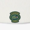 Berretto unisex in lana a coste con badge Berretto unisex in lana a coste con badge
