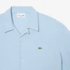 Camicia a maniche corte in piqué dalla vestibilità comoda Camicia a maniche corte in piqué dalla vestibilità comoda