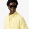 Camicia da uomo in lino a righe dal taglio regolare Camicia da uomo in lino a righe dal taglio regolare
