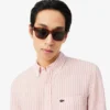 Camicia da uomo in lino a righe dal taglio regolare Camicia da uomo in lino a righe dal taglio regolare