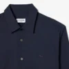 Camicia da uomo slim fit in tessuto elasticizzato con bottoni Camicia da uomo slim fit in tessuto elasticizzato con bottoni
