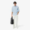 Camicia da uomo slim fit in tessuto elasticizzato con bottoni Camicia da uomo slim fit in tessuto elasticizzato con bottoni