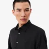 Camicia da uomo slim fit in tessuto elasticizzato con bottoni Camicia da uomo slim fit in tessuto elasticizzato con bottoni