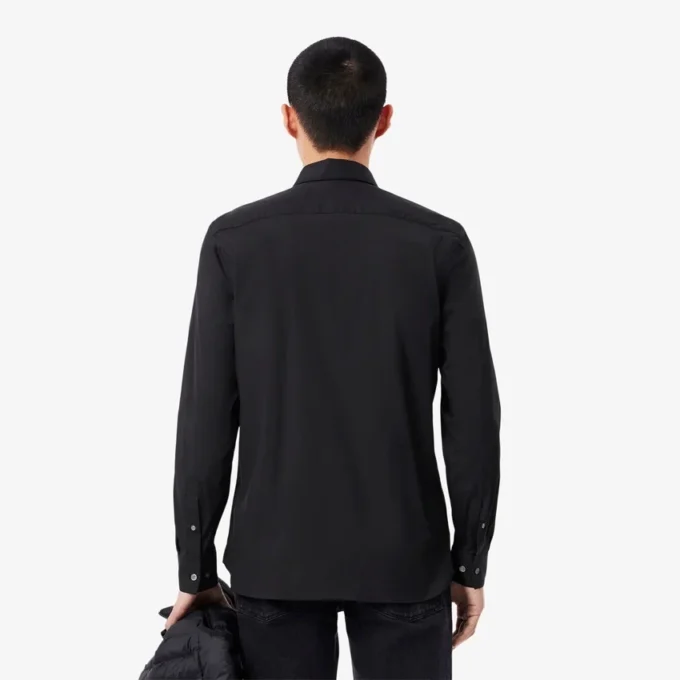 Camicia da uomo slim fit in tessuto elasticizzato con bottoni Camicia da uomo slim fit in tessuto elasticizzato con bottoni
