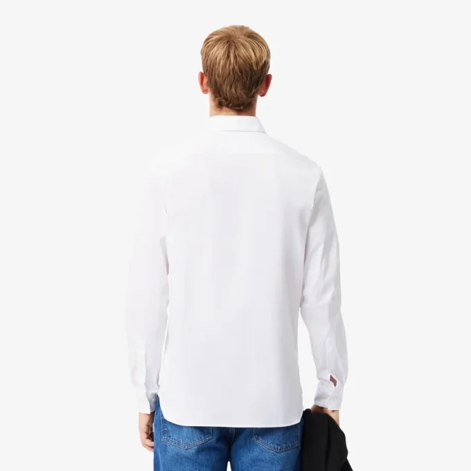 Camicia da uomo slim fit in tessuto elasticizzato con bottoni Camicia da uomo slim fit in tessuto elasticizzato con bottoni