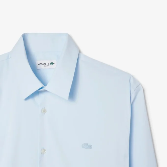 Camicia da uomo slim fit in tessuto elasticizzato con bottoni Camicia da uomo slim fit in tessuto elasticizzato con bottoni