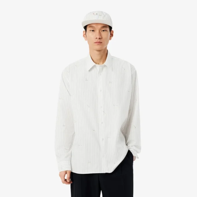 Camicia in cotone ricamata dalla vestibilità comoda Camicia in cotone ricamata dalla vestibilità comoda