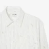 Camicia in cotone ricamata dalla vestibilità comoda Camicia in cotone ricamata dalla vestibilità comoda