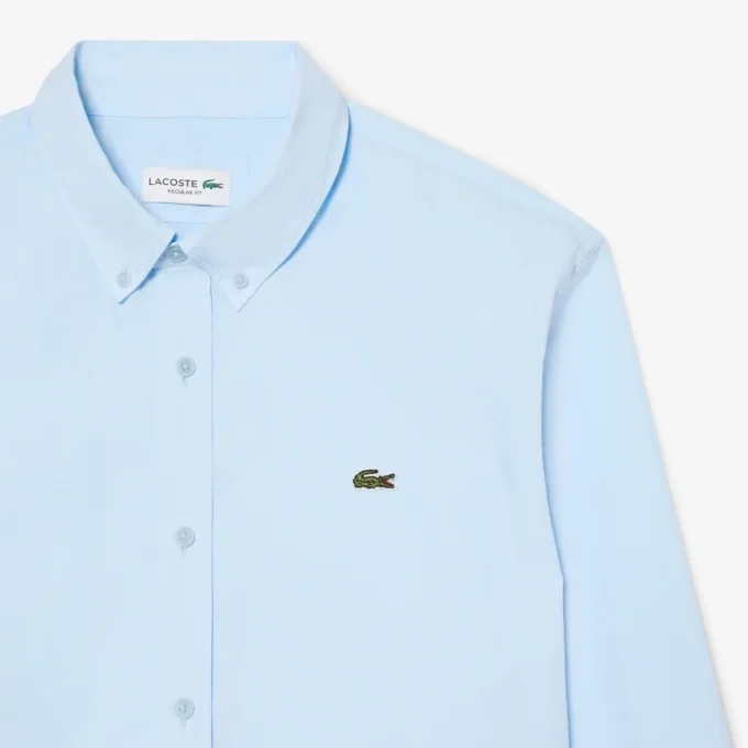 Camicia in popeline elasticizzato dalla vestibilità regolare Camicia in popeline elasticizzato dalla vestibilità regolare