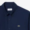 Camicia in popeline elasticizzato dalla vestibilità regolare Camicia in popeline elasticizzato dalla vestibilità regolare
