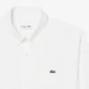Camicia in popeline elasticizzato dalla vestibilità regolare Camicia in popeline elasticizzato dalla vestibilità regolare