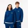 Felpa con cappuccio unisex dalla vestibilità ampia con dettaglio badge Felpa con cappuccio unisex dalla vestibilità ampia con dettaglio badge