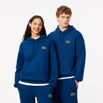 Felpa con cappuccio unisex dalla vestibilità ampia con dettaglio badge