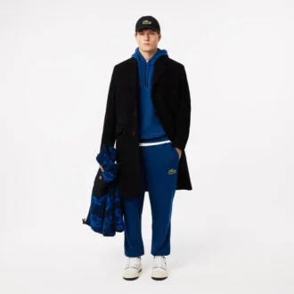 Felpa con cappuccio unisex dalla vestibilità ampia con dettaglio badge
