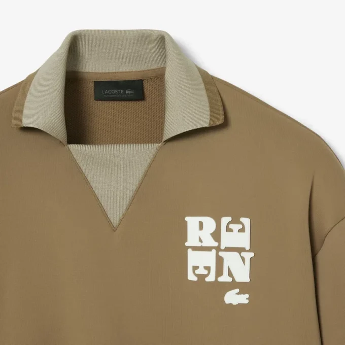 Felpa con colletto polo Runway e badge decorativo Felpa con colletto polo Runway e badge decorativo