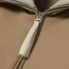 Felpa con collo alto, zip e badge decorativo Felpa con collo alto, zip e badge decorativo