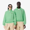 Felpa unisex dalla vestibilità ampia con mezzo zip e badge Felpa unisex dalla vestibilità ampia con mezzo zip e badge