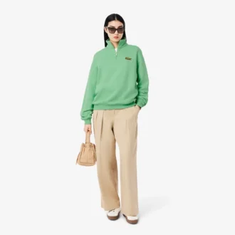 Felpa unisex dalla vestibilità ampia con mezzo zip e badge