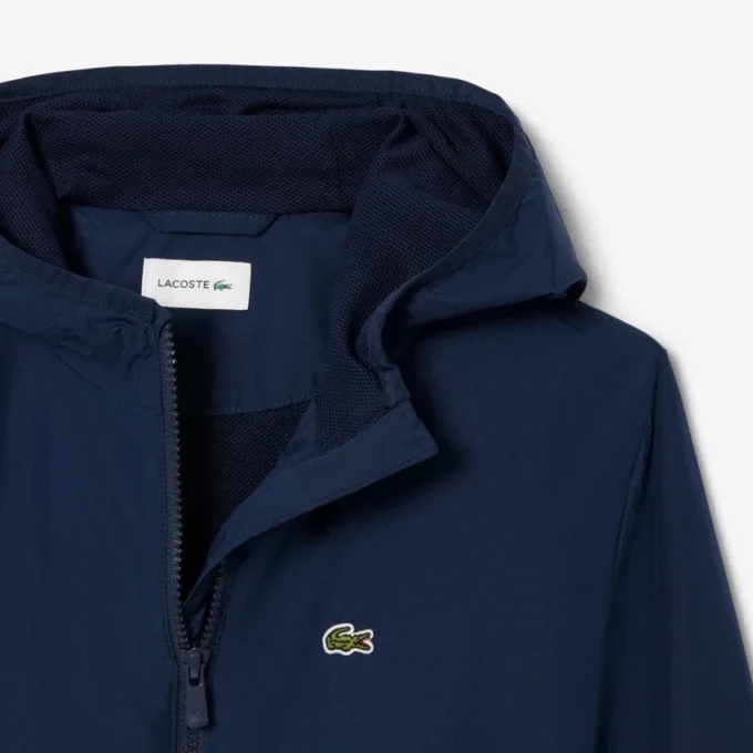 Giacca a vento unisex con cappuccio Giacca a vento unisex con cappuccio