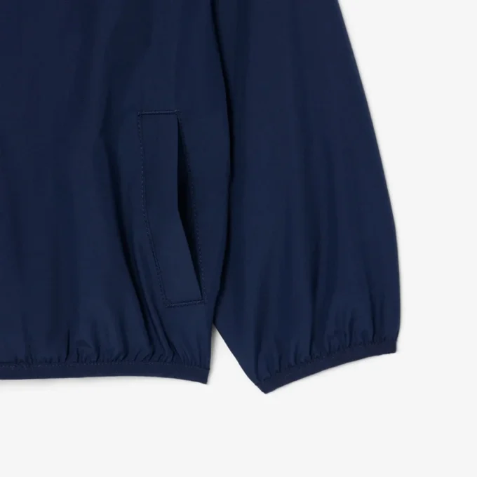Giacca a vento unisex con cappuccio Giacca a vento unisex con cappuccio
