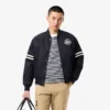 Giacca bomber da uomo idrorepellente con stemma ricamato Giacca bomber da uomo idrorepellente con stemma ricamato