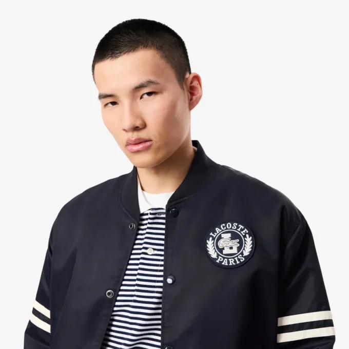 Giacca bomber da uomo idrorepellente con stemma ricamato Giacca bomber da uomo idrorepellente con stemma ricamato