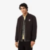 Giacca bomber idrorepellente con badge retrò Giacca bomber idrorepellente con badge retrò