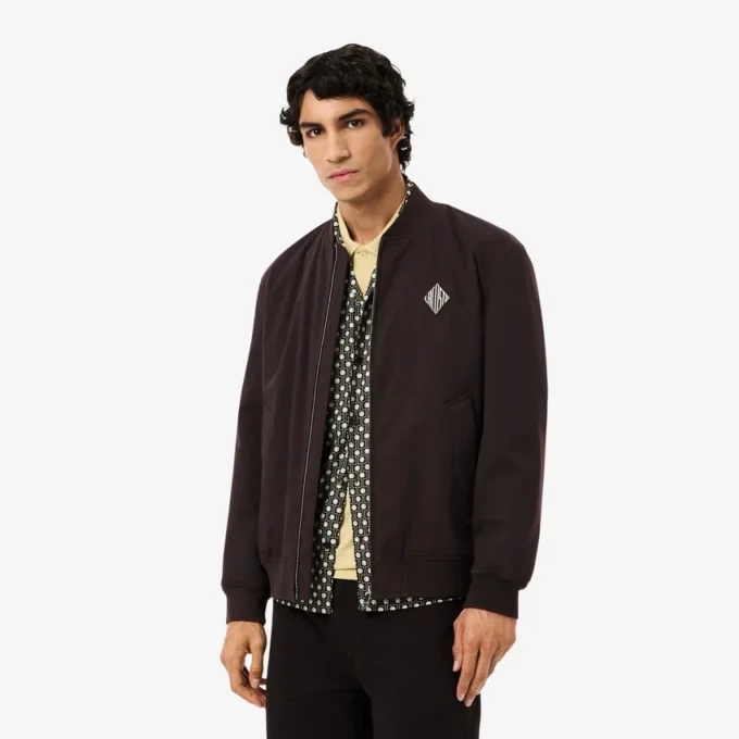 Giacca bomber idrorepellente con badge retrò Giacca bomber idrorepellente con badge retrò