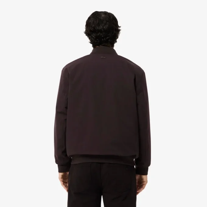 Giacca bomber idrorepellente con badge retrò Giacca bomber idrorepellente con badge retrò