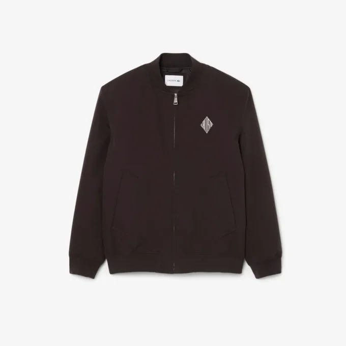 Giacca bomber idrorepellente con badge retrò Giacca bomber idrorepellente con badge retrò