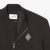 Giacca bomber idrorepellente con badge retrò Giacca bomber idrorepellente con badge retrò