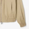 Giacca elasticizzata da donna con doppio colletto Giacca elasticizzata da donna con doppio colletto