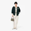Gilet da donna in maglia a trecce di lana Gilet da donna in maglia a trecce di lana
