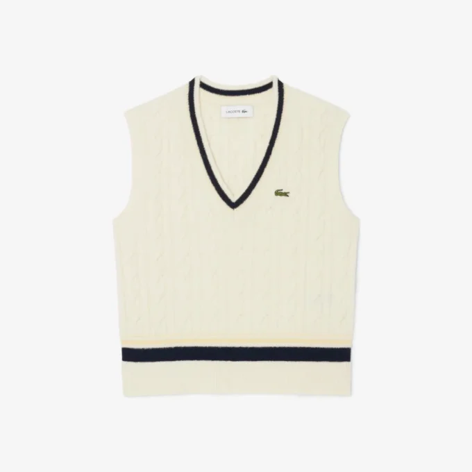 Gilet da donna in maglia a trecce di lana Gilet da donna in maglia a trecce di lana