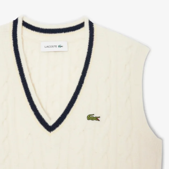 Gilet da donna in maglia a trecce di lana Gilet da donna in maglia a trecce di lana