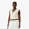 Gilet da donna in maglia a trecce di lana Gilet da donna in maglia a trecce di lana