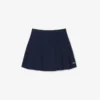 Gonna corta a pieghe in cotone elasticizzato da donna Gonna corta a pieghe in cotone elasticizzato da donna