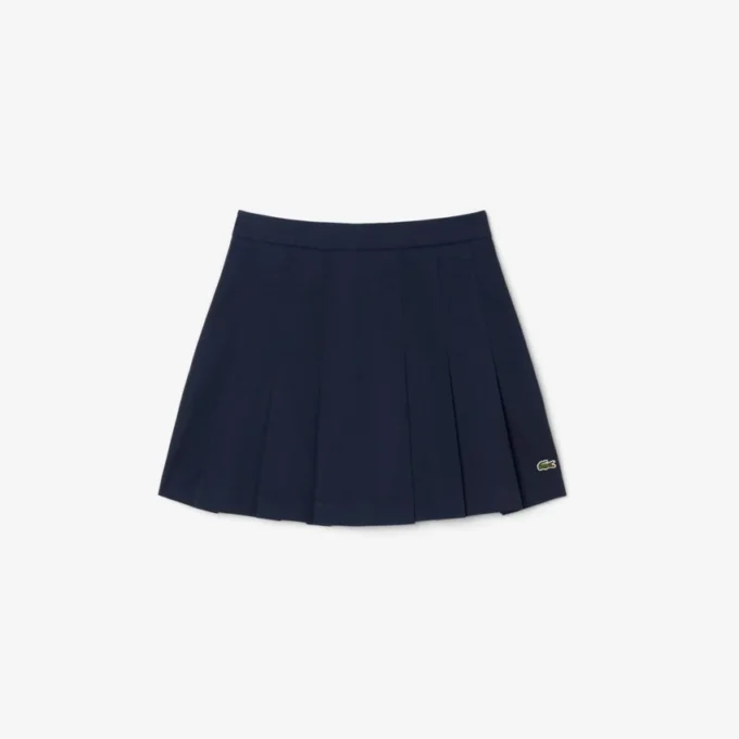 Gonna corta a pieghe in cotone elasticizzato da donna Gonna corta a pieghe in cotone elasticizzato da donna