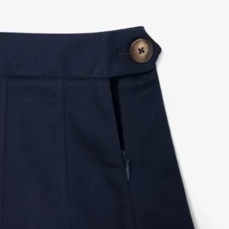 Gonna corta a pieghe in cotone elasticizzato da donna