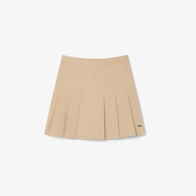 Gonna corta a pieghe in cotone elasticizzato da donna Gonna corta a pieghe in cotone elasticizzato da donna